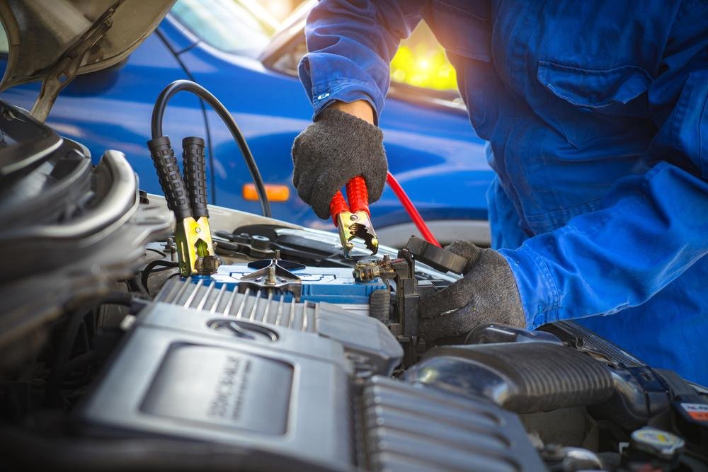 Battery boost with jumper cables in Woodstock